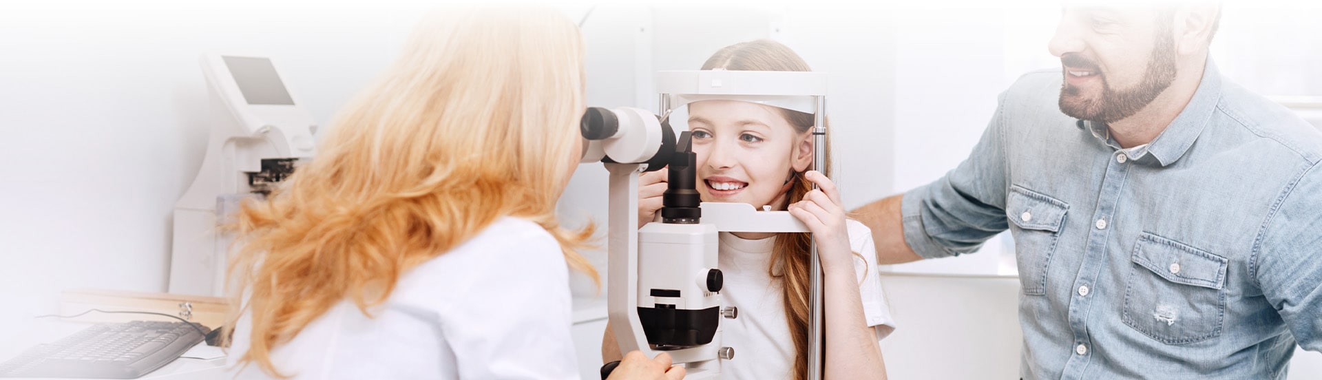 young girl at eye doctor