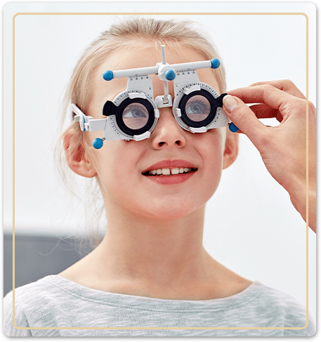 child wearing eye test goggles